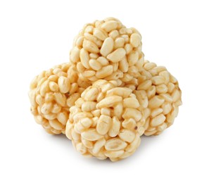 Photo of Delicious puffed rice balls isolated on white