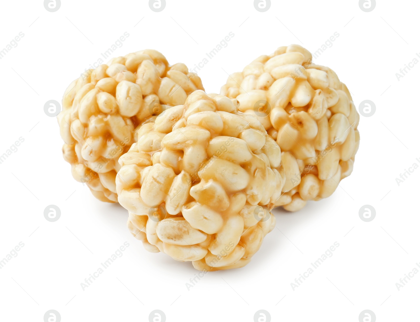 Photo of Delicious puffed rice balls isolated on white