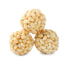 Photo of Delicious puffed rice balls isolated on white