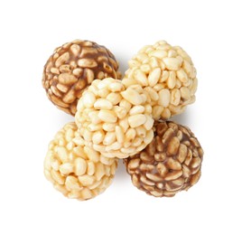 Photo of Tasty puffed rice balls isolated on white, top view