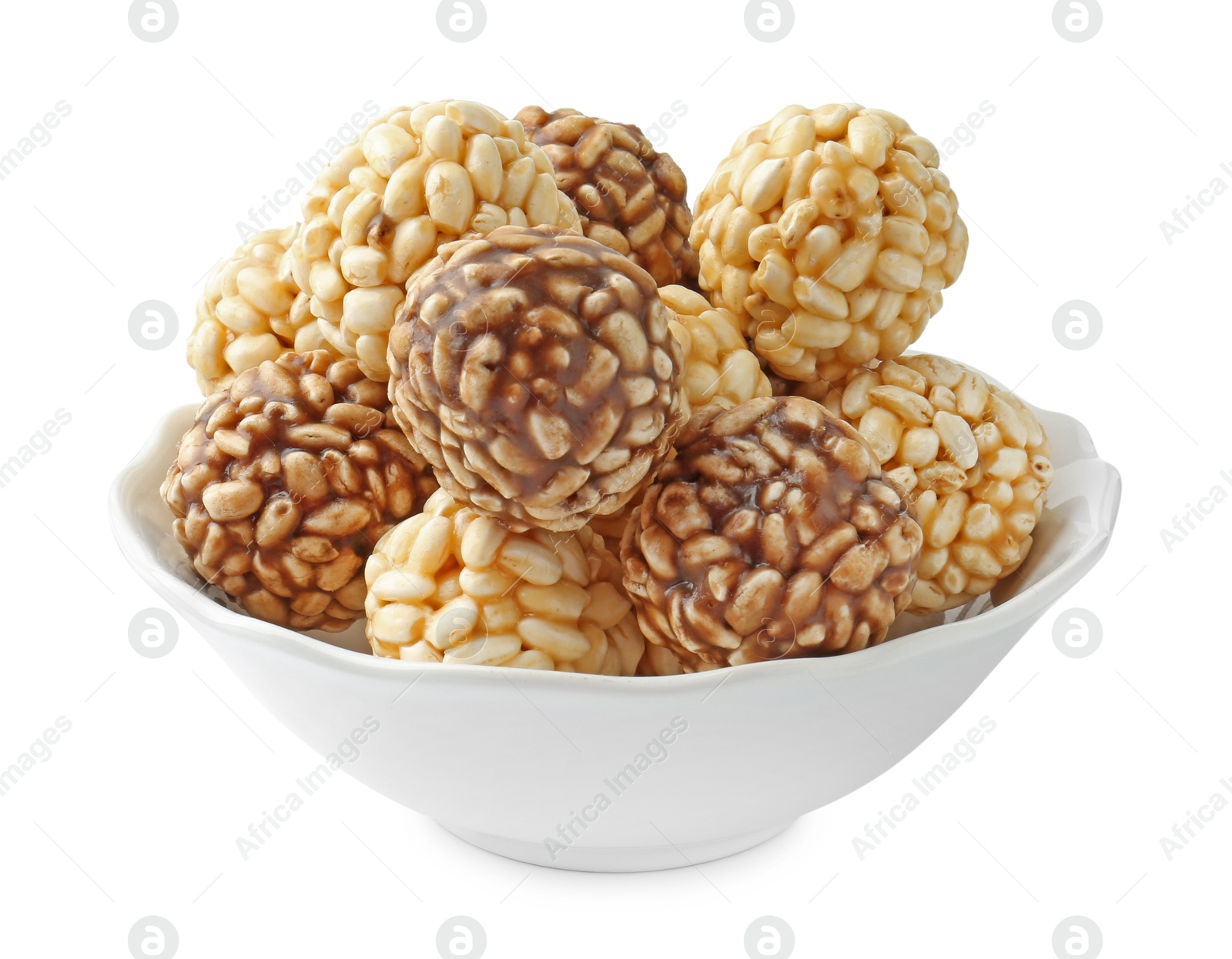 Photo of Tasty puffed rice balls in bowl isolated on white