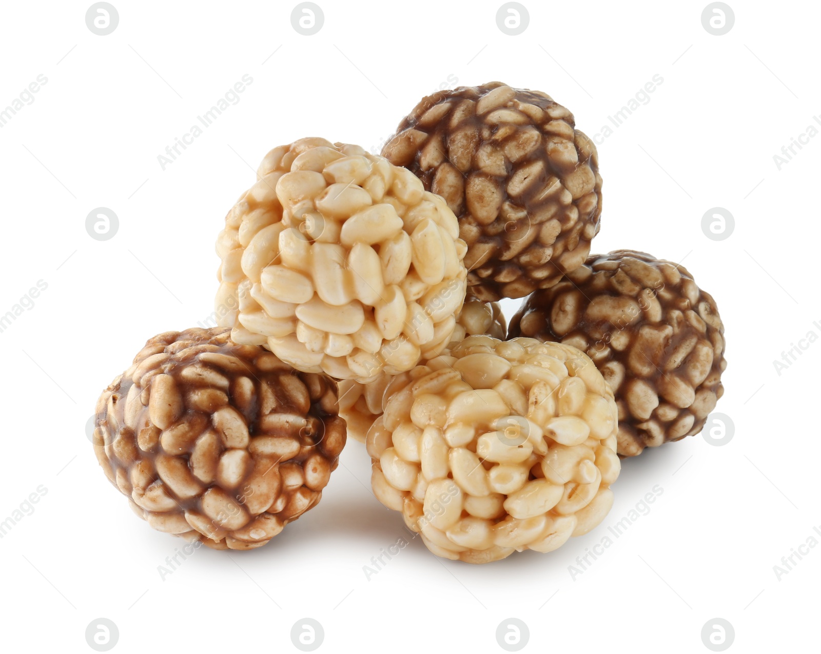 Photo of Tasty puffed rice balls isolated on white