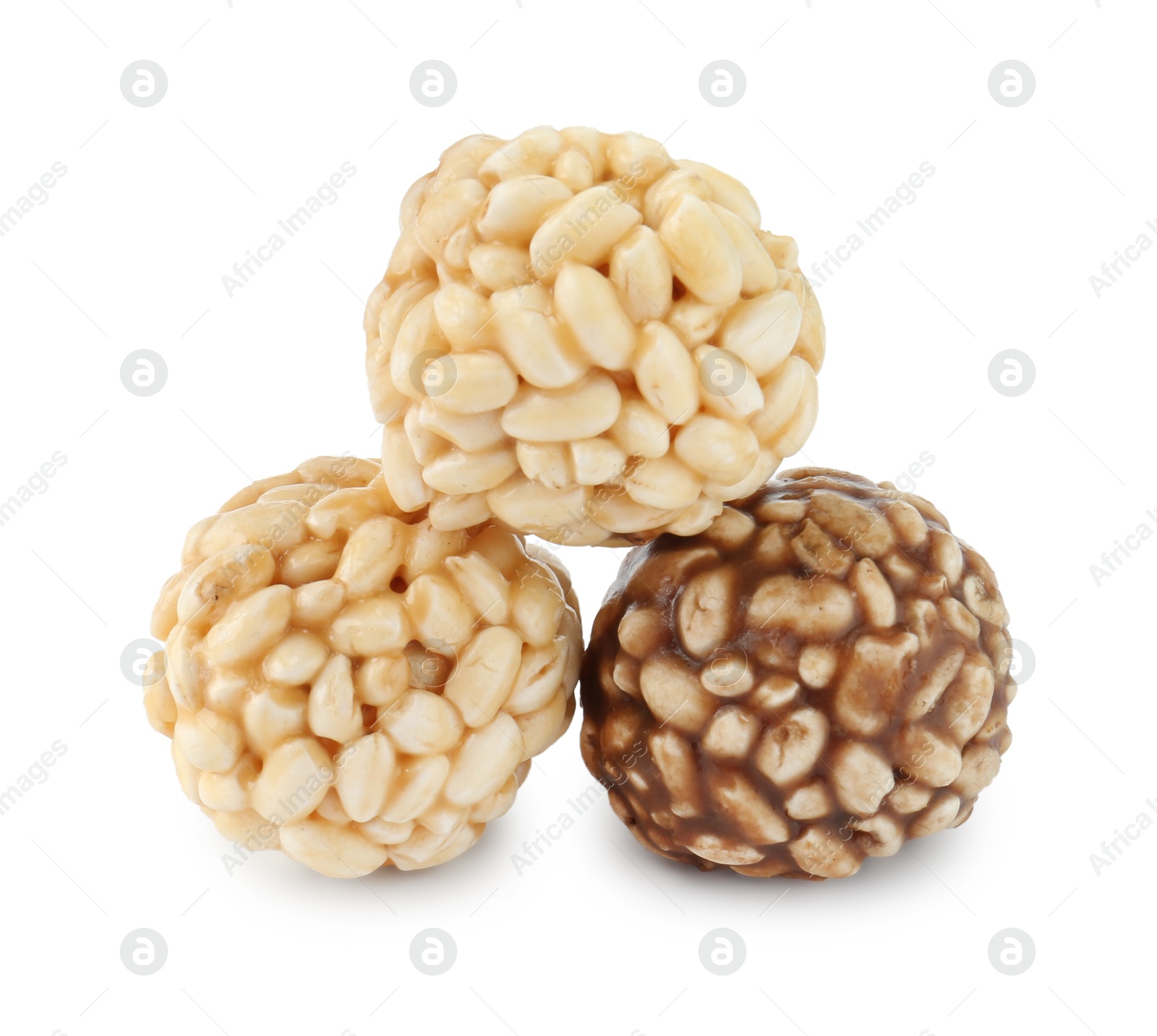 Photo of Tasty puffed rice balls isolated on white