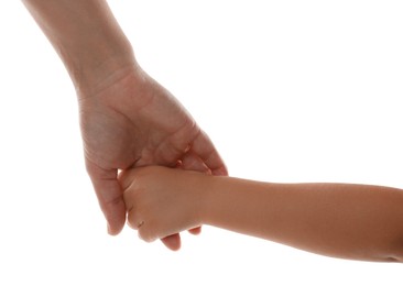 Mother and child holding hands on white background, closeup