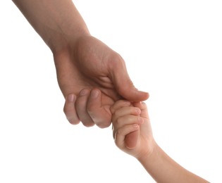 Father and child holding hands on white background, closeup