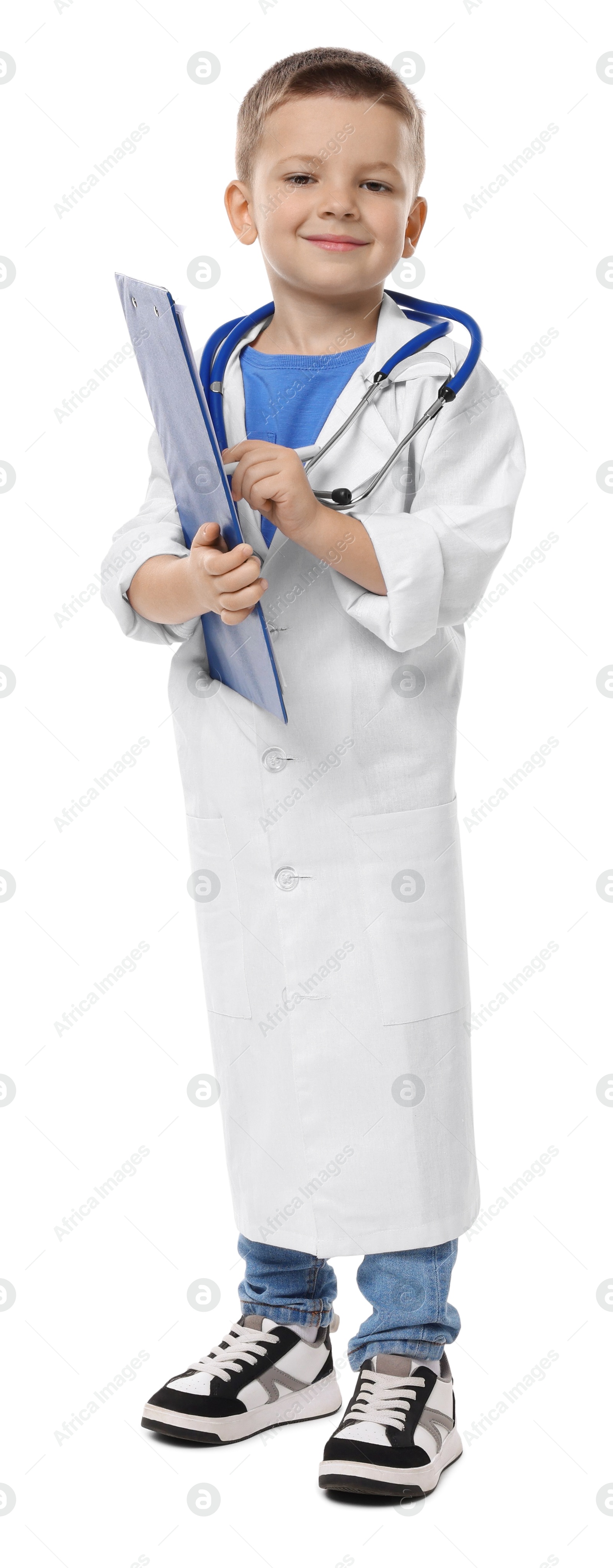 Photo of Little boy with stethoscope and clipboard pretending to be doctor on white background. Dreaming of future profession