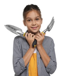 Photo of Girl with tools pretending to be gardener on white background. Dreaming of future profession