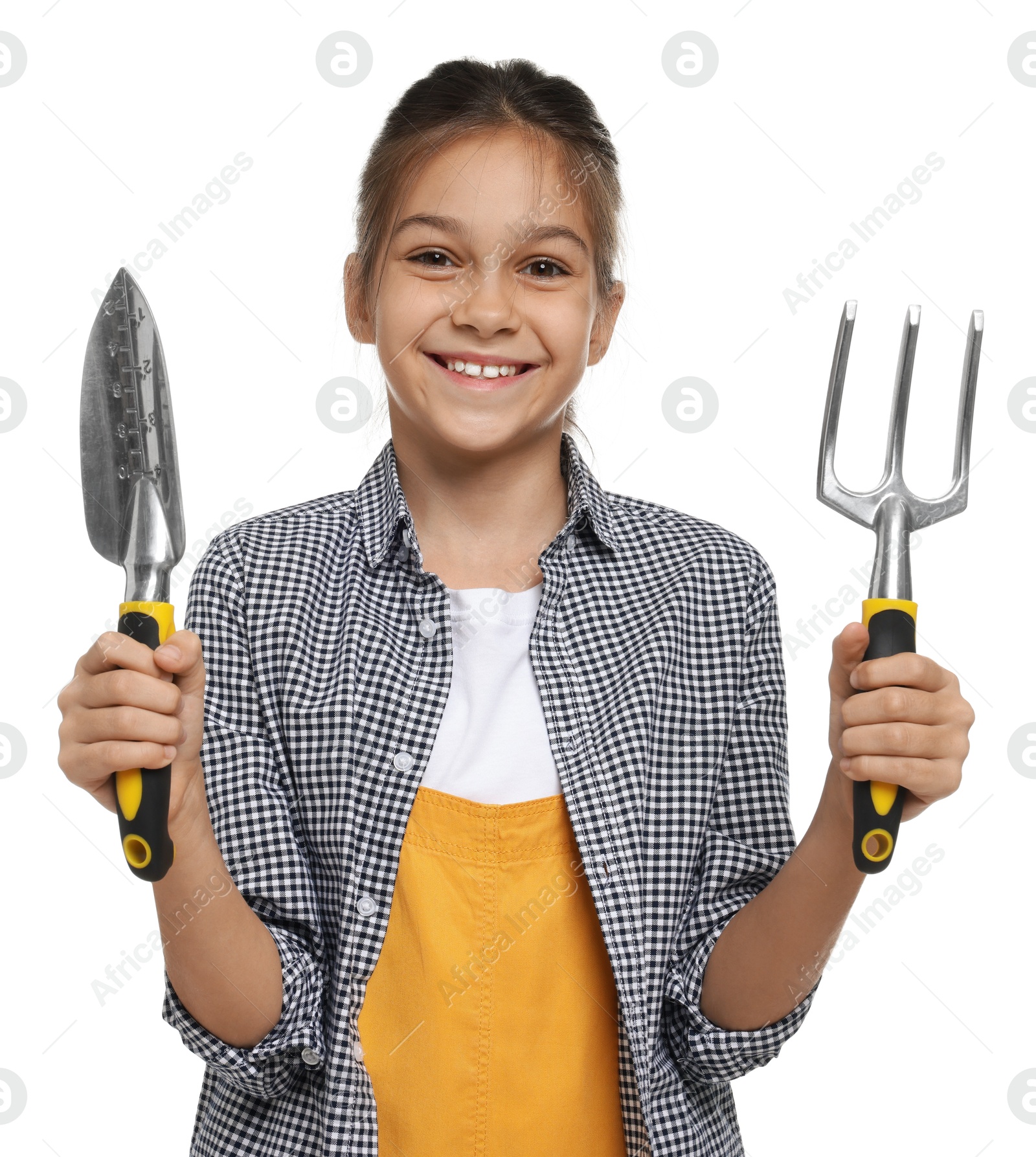 Photo of Girl with tools pretending to be gardener on white background. Dreaming of future profession