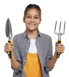 Photo of Girl with tools pretending to be gardener on white background. Dreaming of future profession