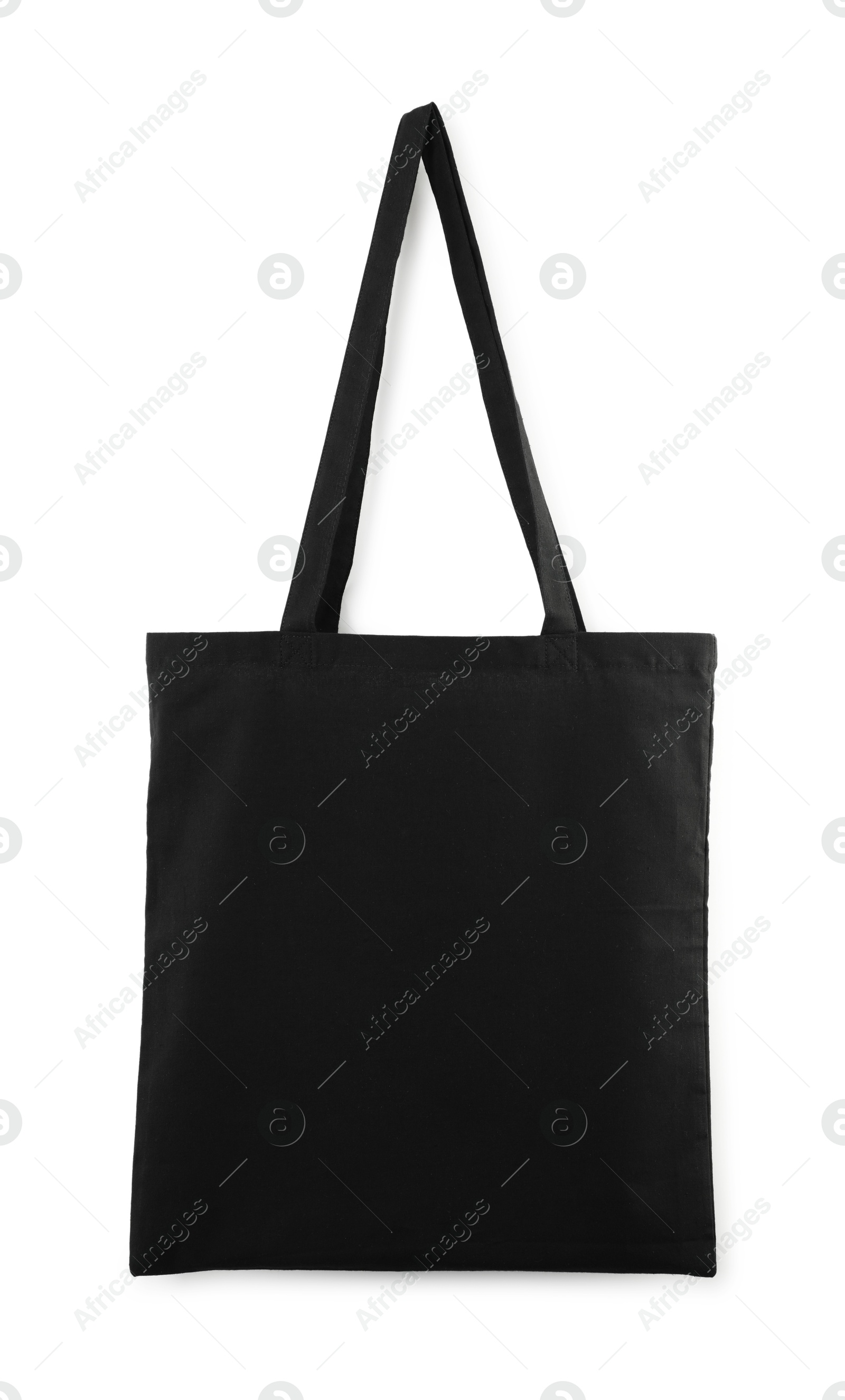 Photo of One black shopping bag isolated on white. Mockup for design