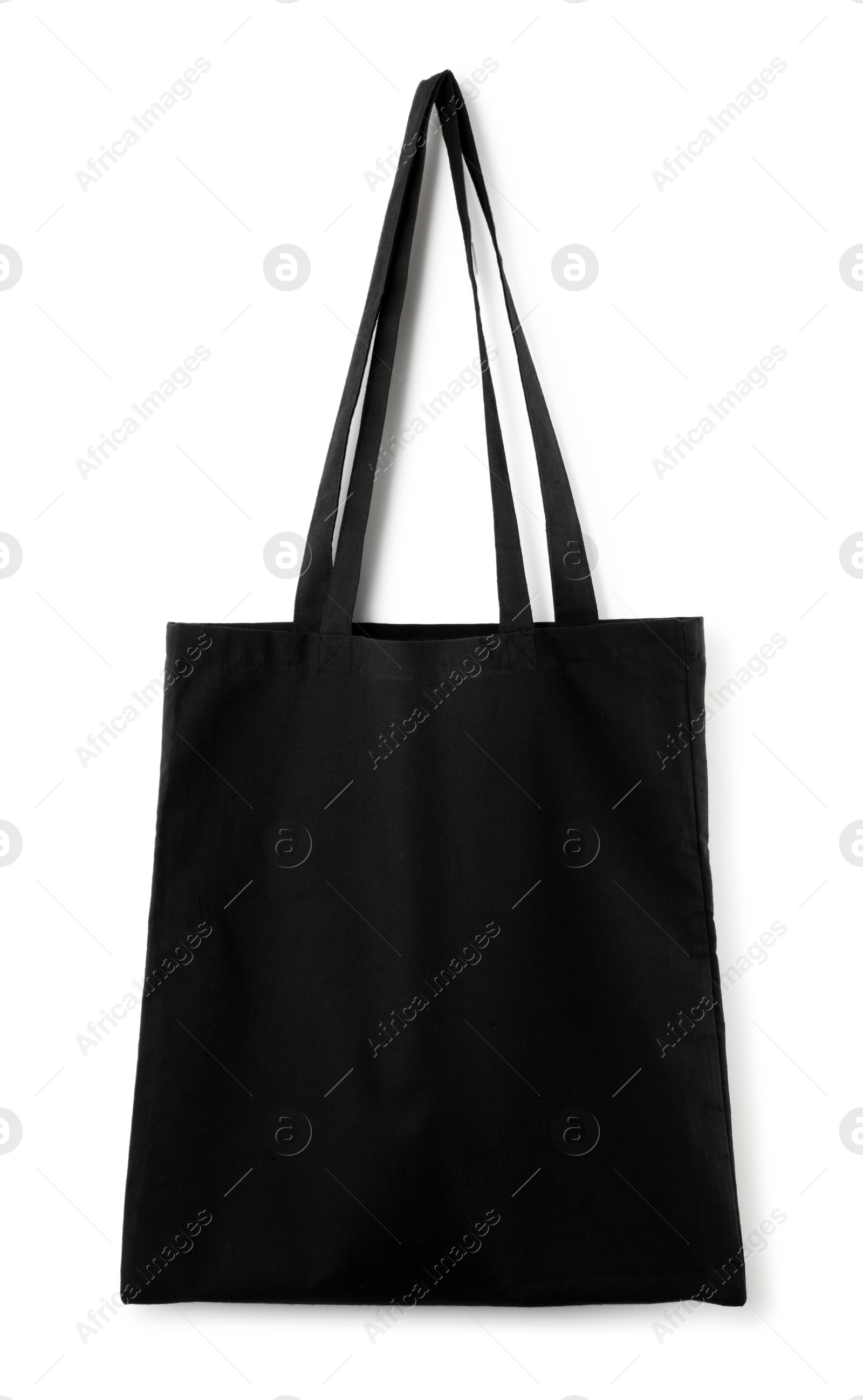 Photo of One black shopping bag isolated on white. Mockup for design