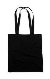 One black shopping bag isolated on white. Mockup for design