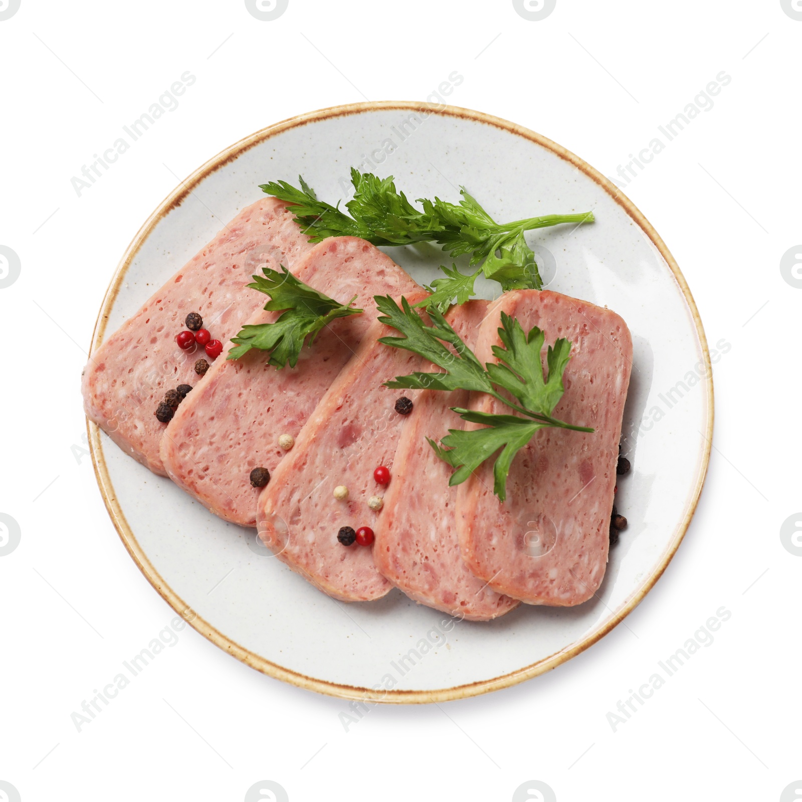 Photo of Tasty canned meat, parsley and peppercorns isolated on white, top view