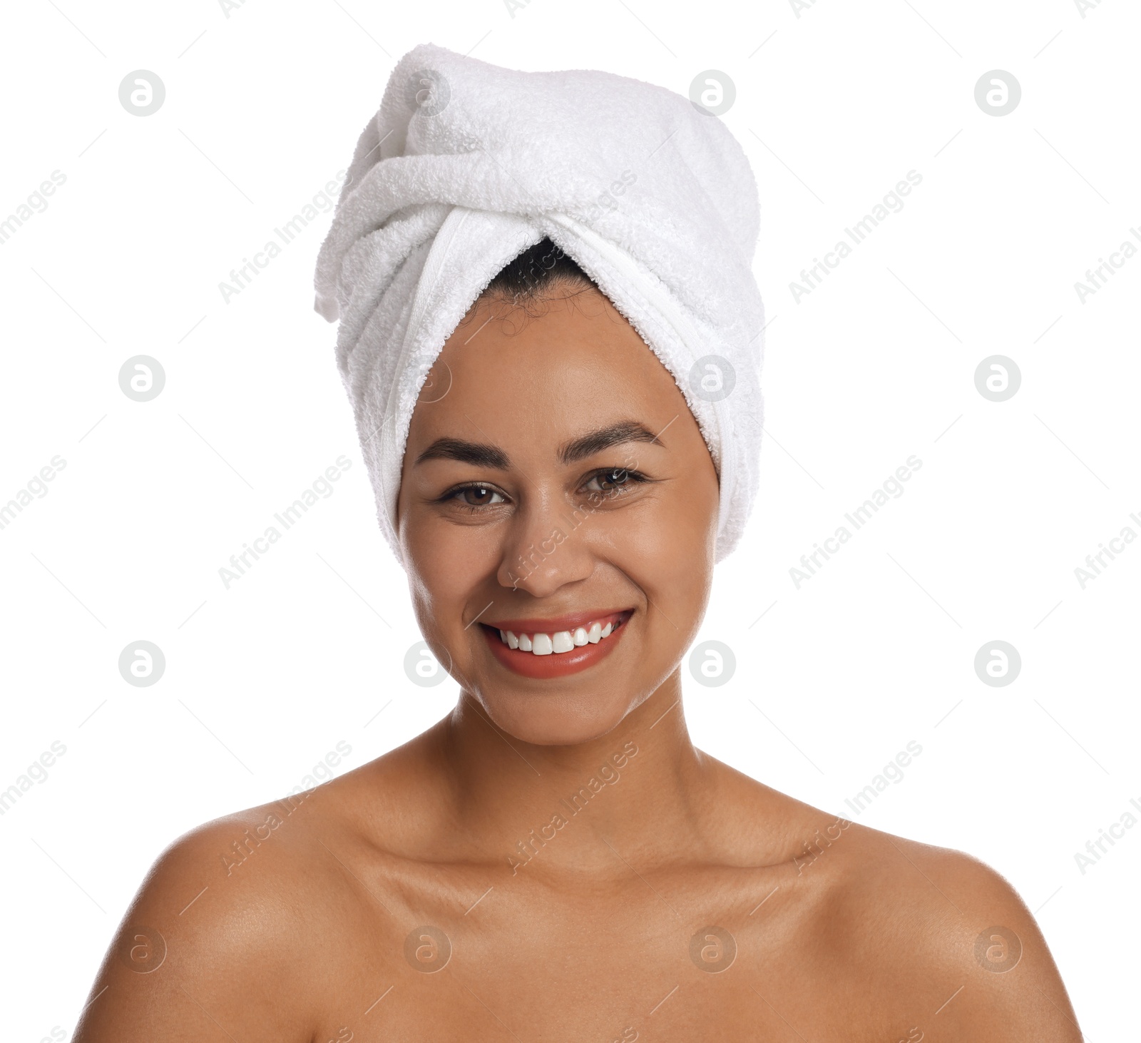 Photo of Beautiful young woman with towel on head against white background