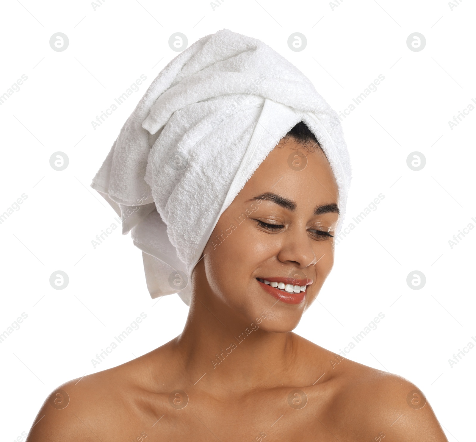 Photo of Beautiful young woman with towel on head against white background