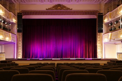 Theatre interior with stage and rows of comfortable seats