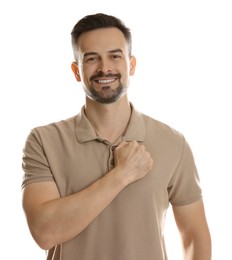 Photo of Man making promise on white background. Oath gesture