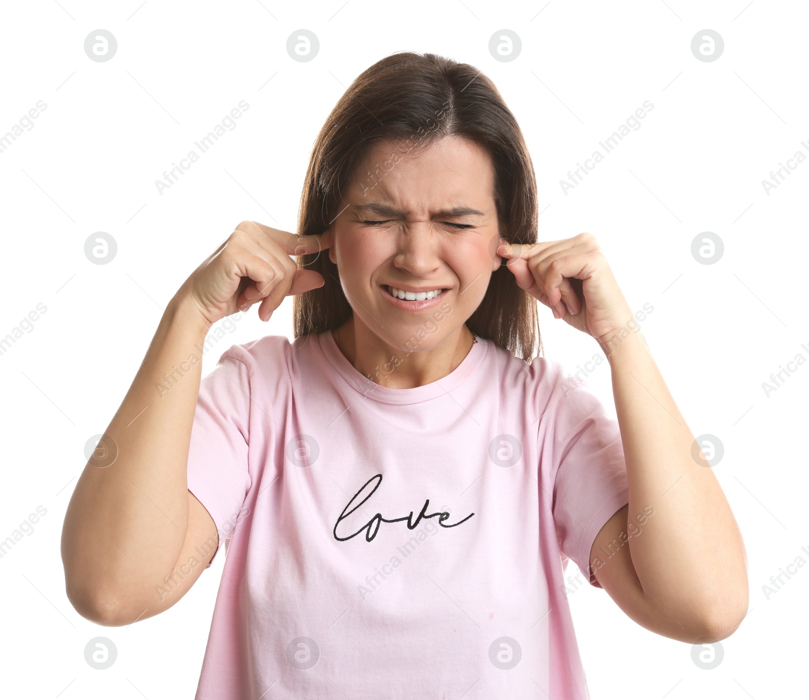 Photo of Woman covering her ears with fingers on white background