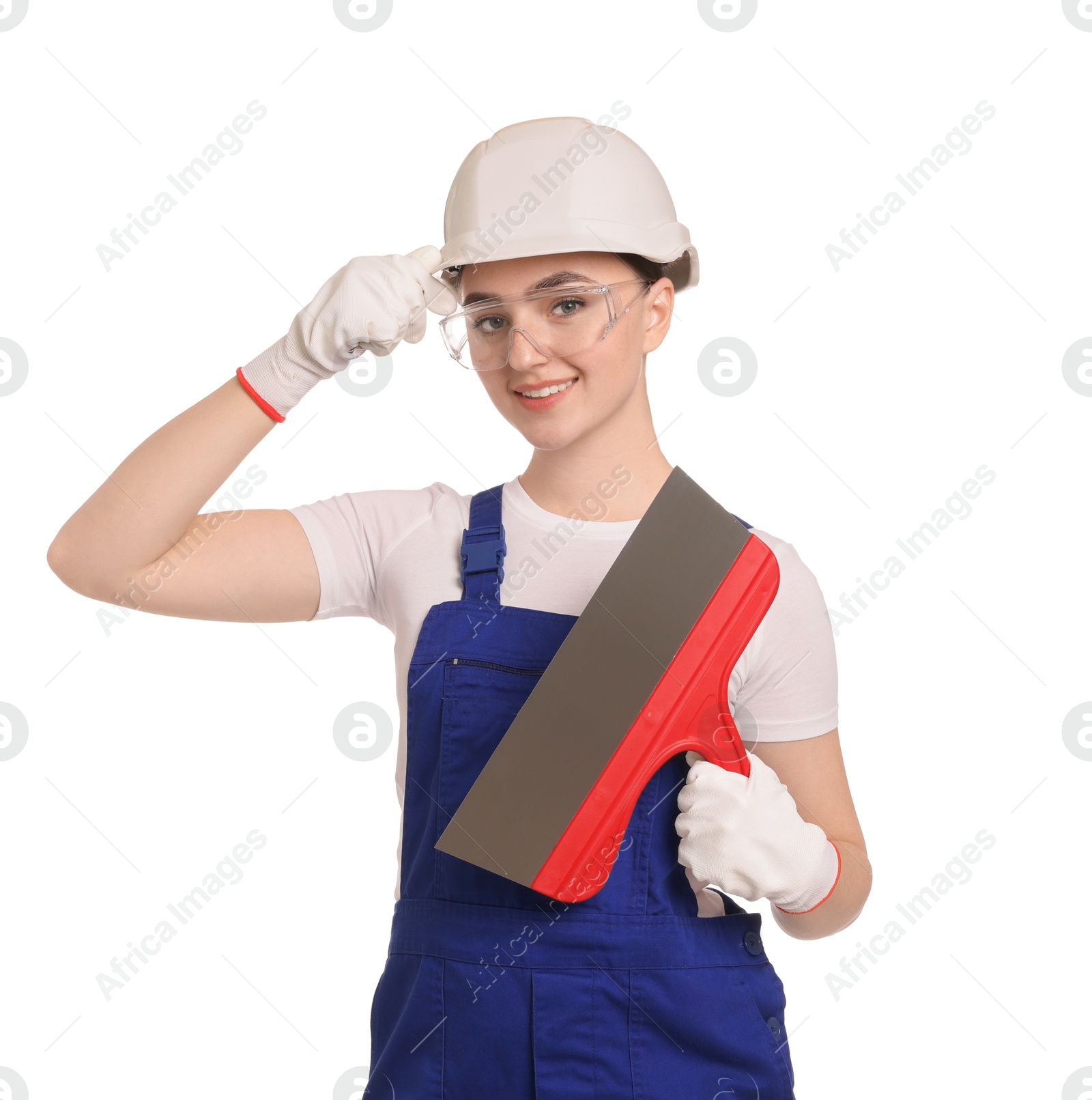 Photo of Portrait of young decorator with putty knife on white background