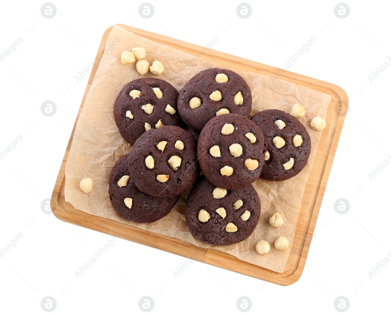 Photo of Tasty chocolate cookies with hazelnuts isolated on white, top view