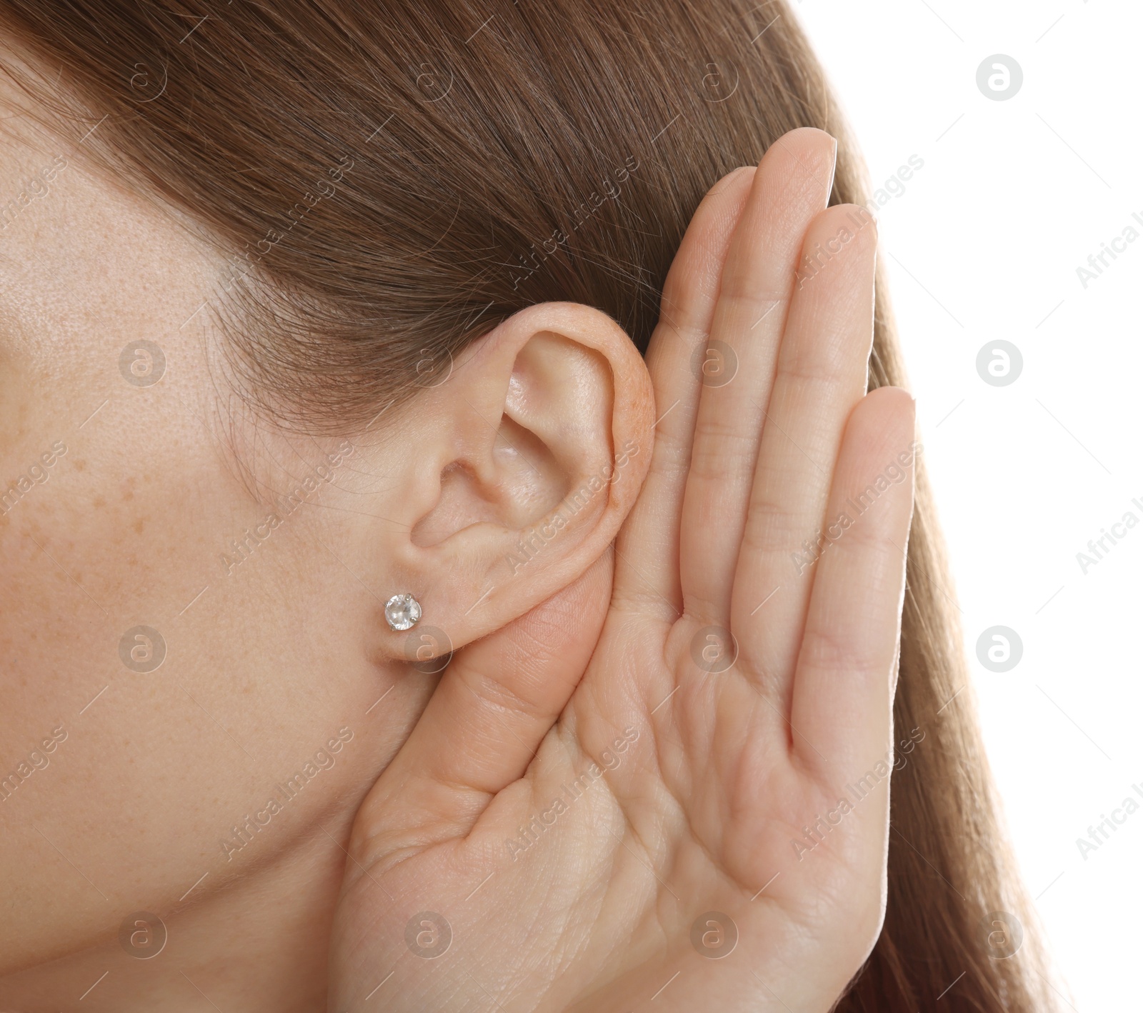 Photo of Woman showing hand to ear gesture on white background, closeup