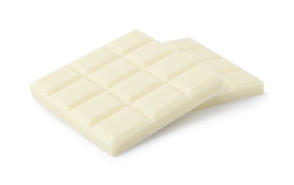 Photo of Pieces of delicious white chocolate isolated on white