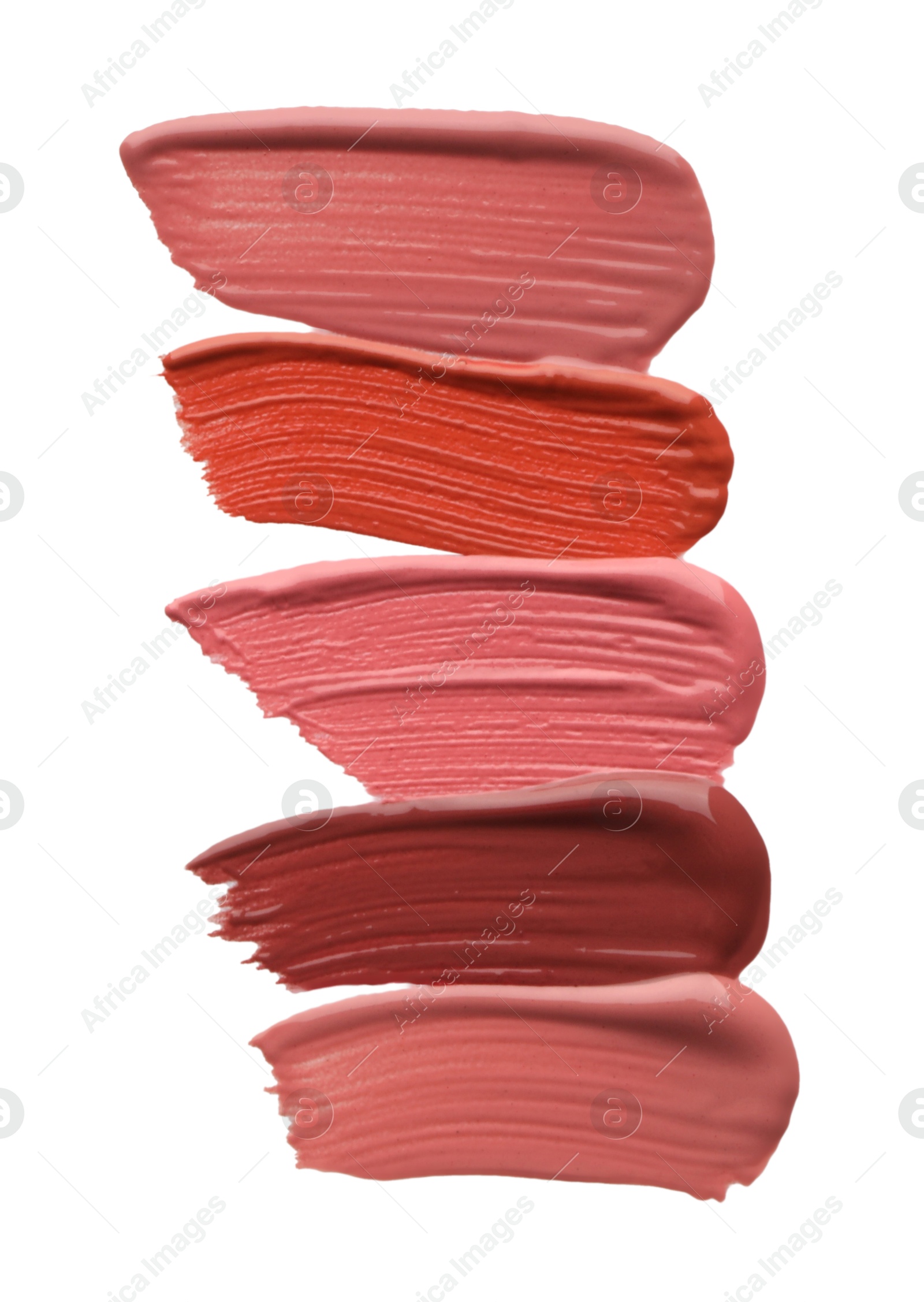 Photo of Different lipsticks isolated on white, top view. Samples of cosmetic product