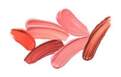 Photo of Different lipsticks isolated on white, top view. Samples of cosmetic product