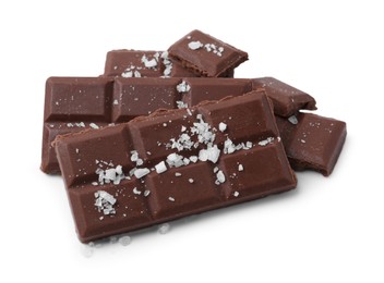 Photo of Pieces of chocolate with salt isolated on white