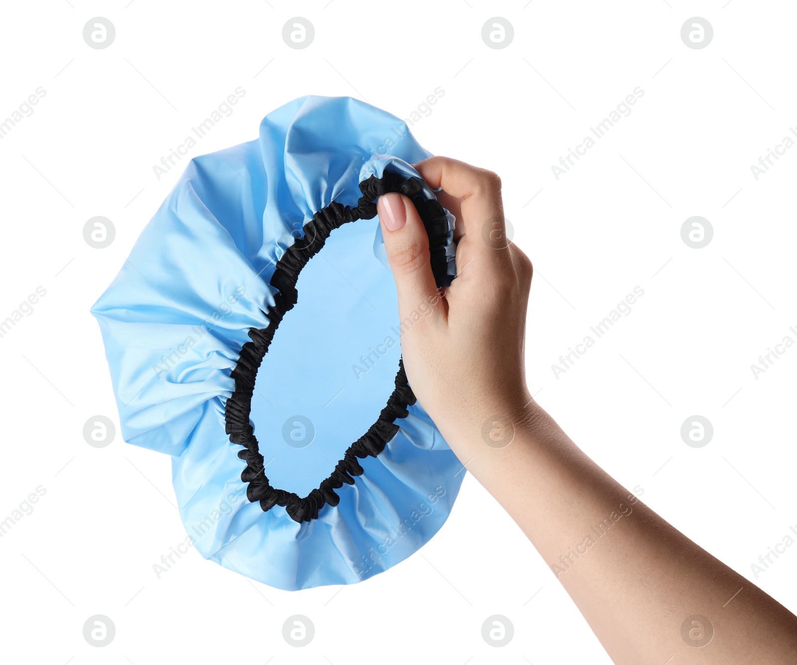 Photo of Woman holding blue shower cap on white background, closeup