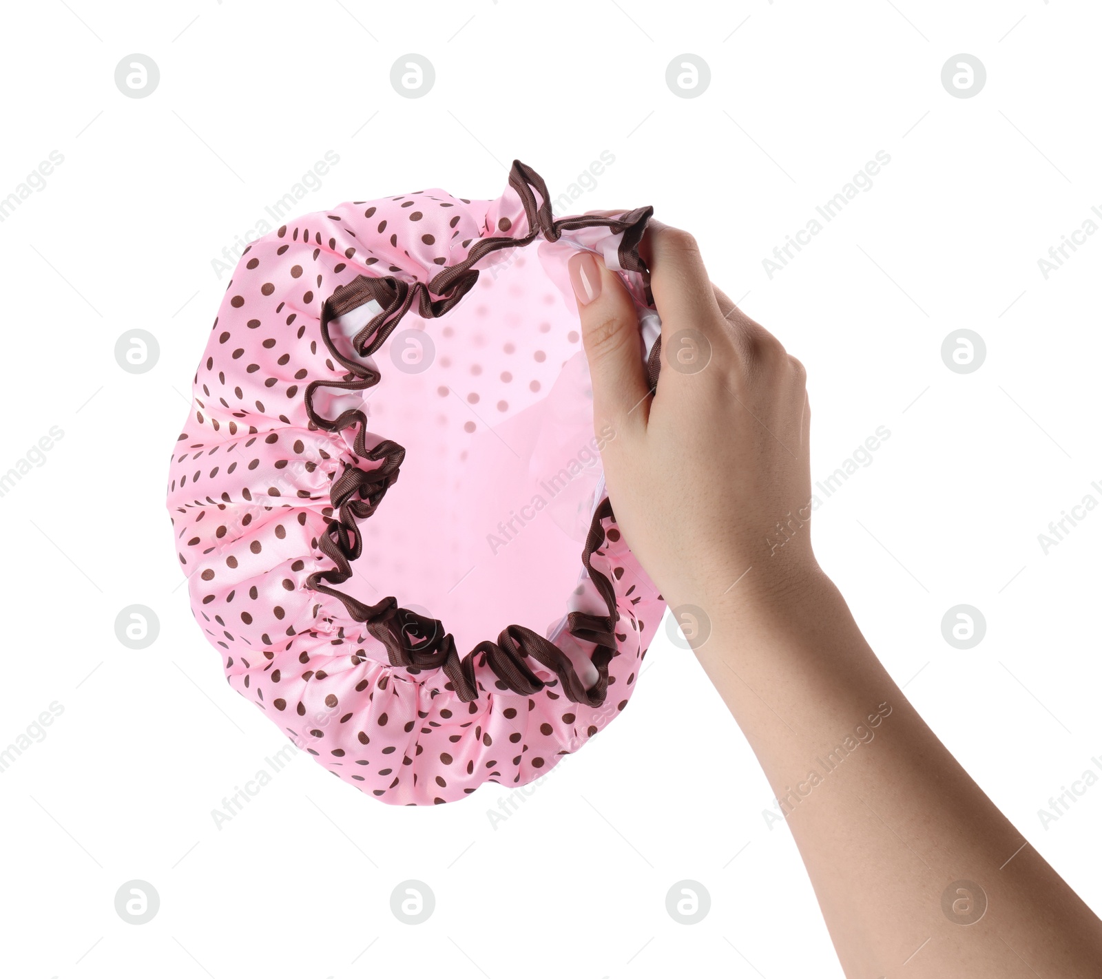 Photo of Woman holding pink shower cap on white background, closeup