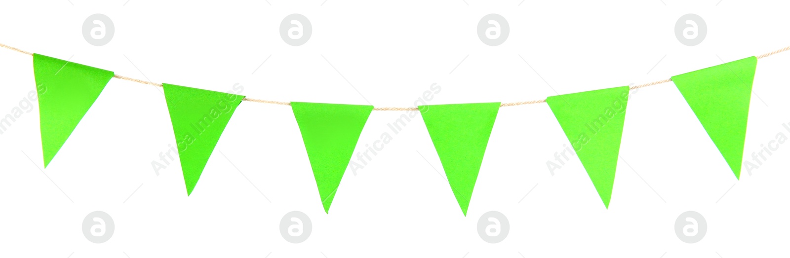 Photo of Green party flags isolated on white. Festive decor