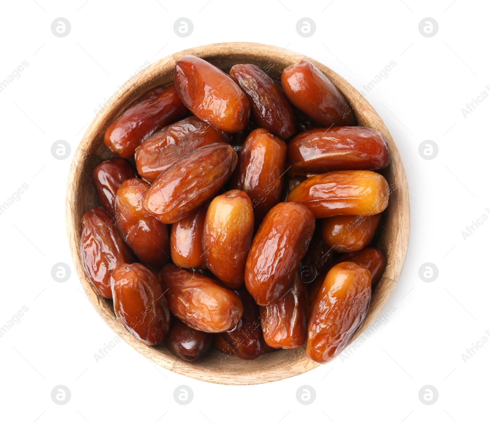 Photo of Tasty dried dates in wooden bowl isolated on white, top view