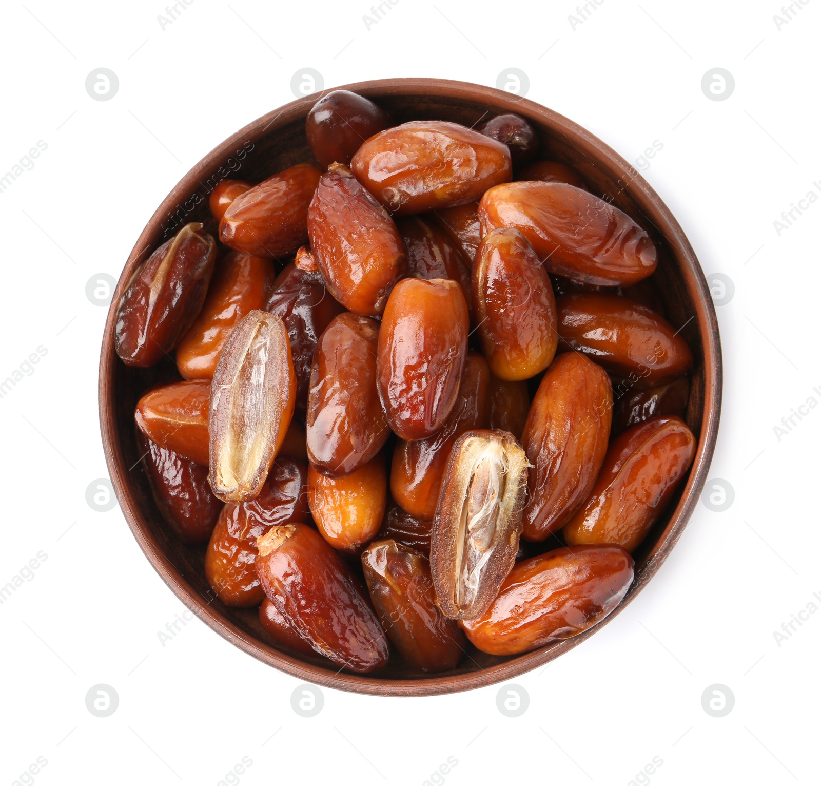 Photo of Tasty dried dates in bowl isolated on white, top view