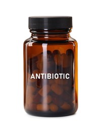 Image of Bottle of antibiotic pills on white background