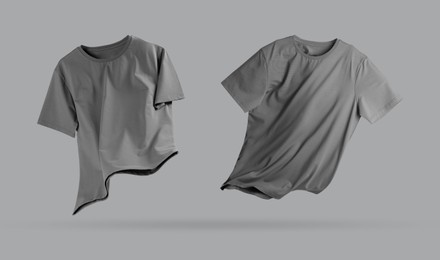 Image of Grey t-shirt in air on color background