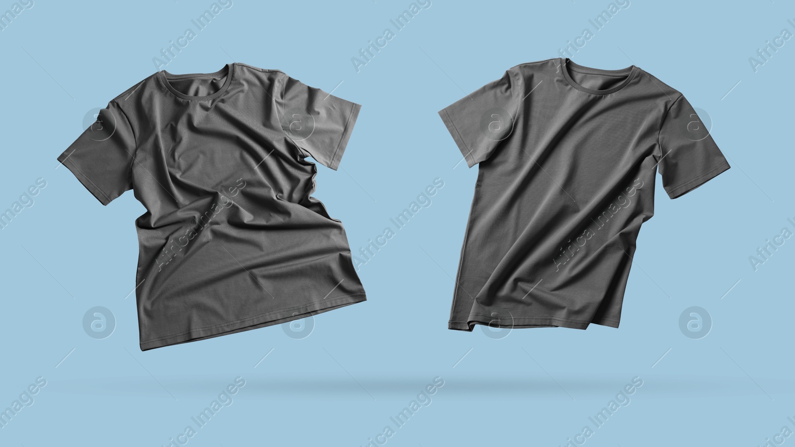 Image of Grey t-shirt in air on light blue background