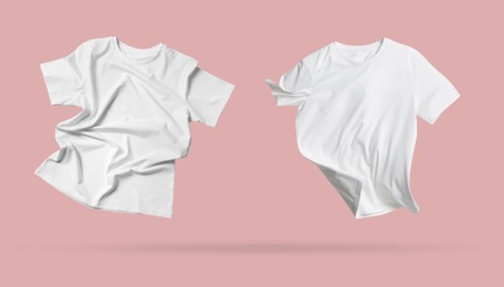 Image of White t-shirts in air on pink background