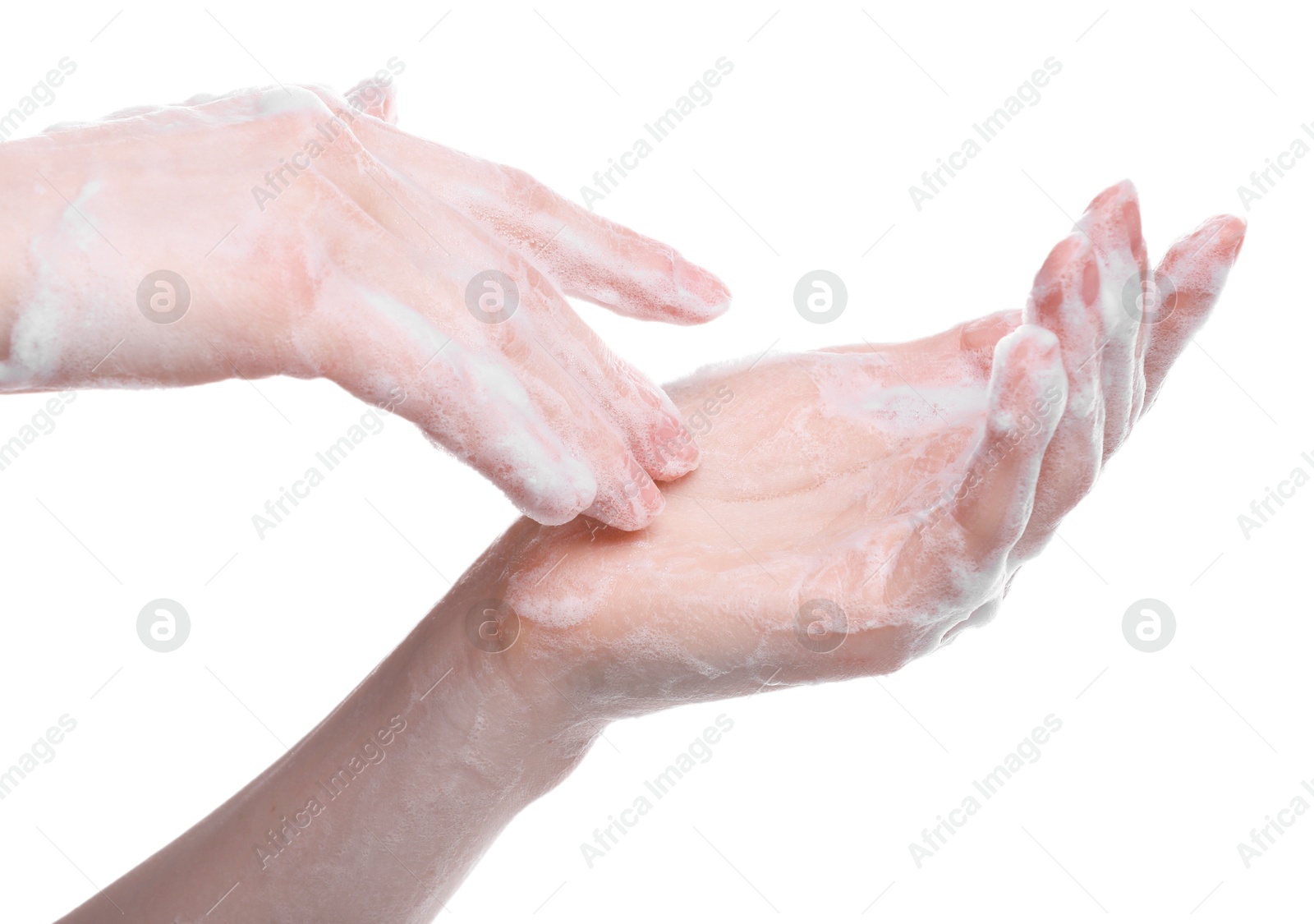 Photo of Woman washing hands with cleansing foam on white background, closeup