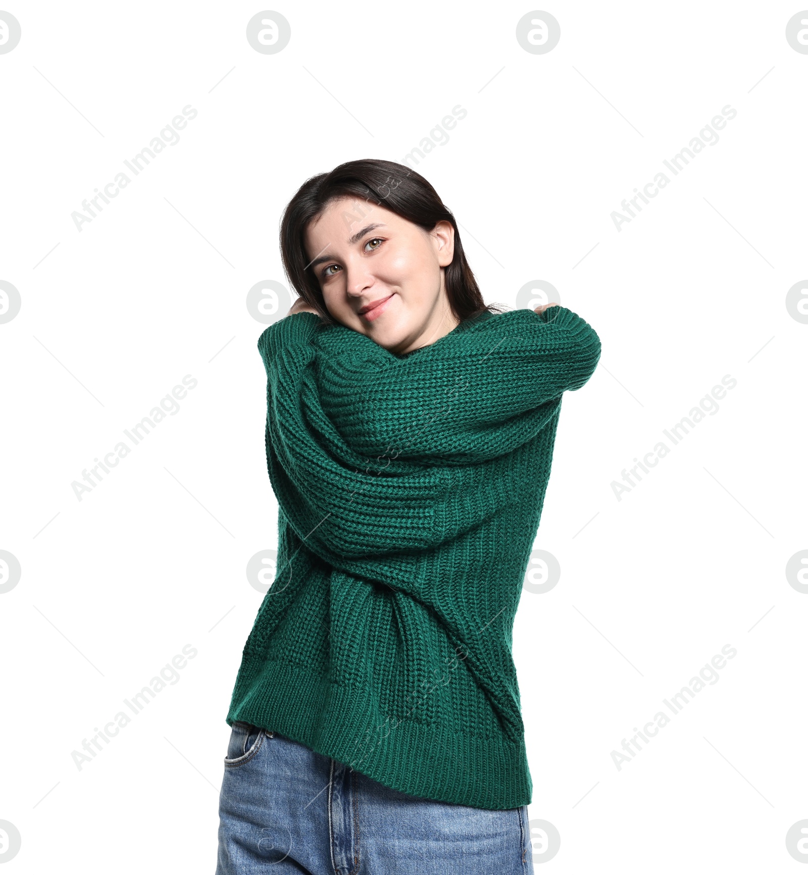 Photo of Beautiful young woman hugging herself on white background