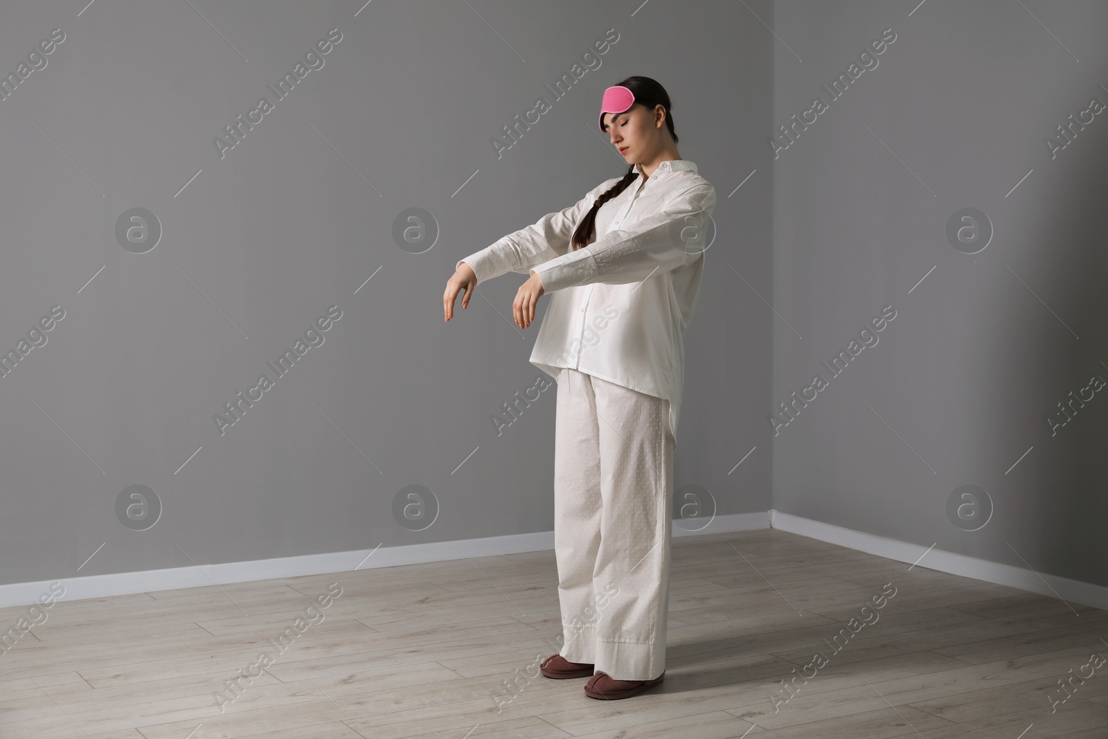 Photo of Young woman suffering from sleepwalking at home