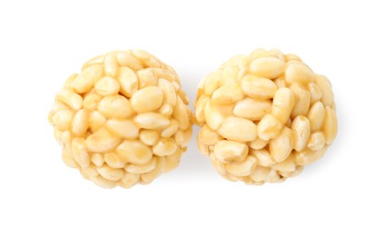 Photo of Delicious puffed rice balls isolated on white, top view