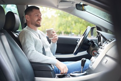 Photo of Man driving modern car, view through window