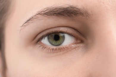 Photo of Closeup view of young woman with beautiful eyes