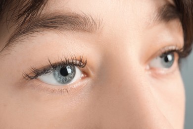 Closeup view of young woman with beautiful blue eyes