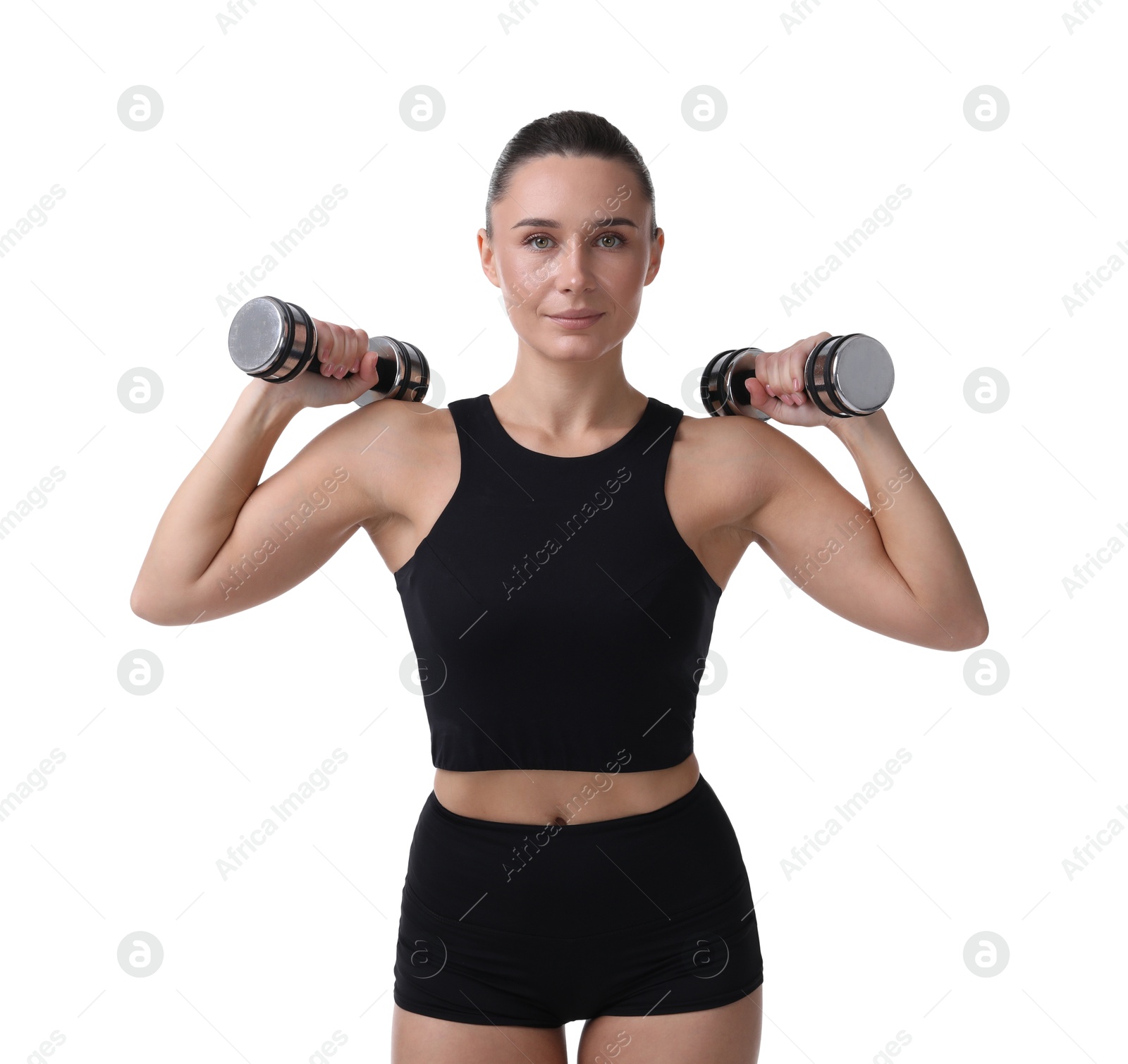 Photo of Woman exercising with dumbbells on white background