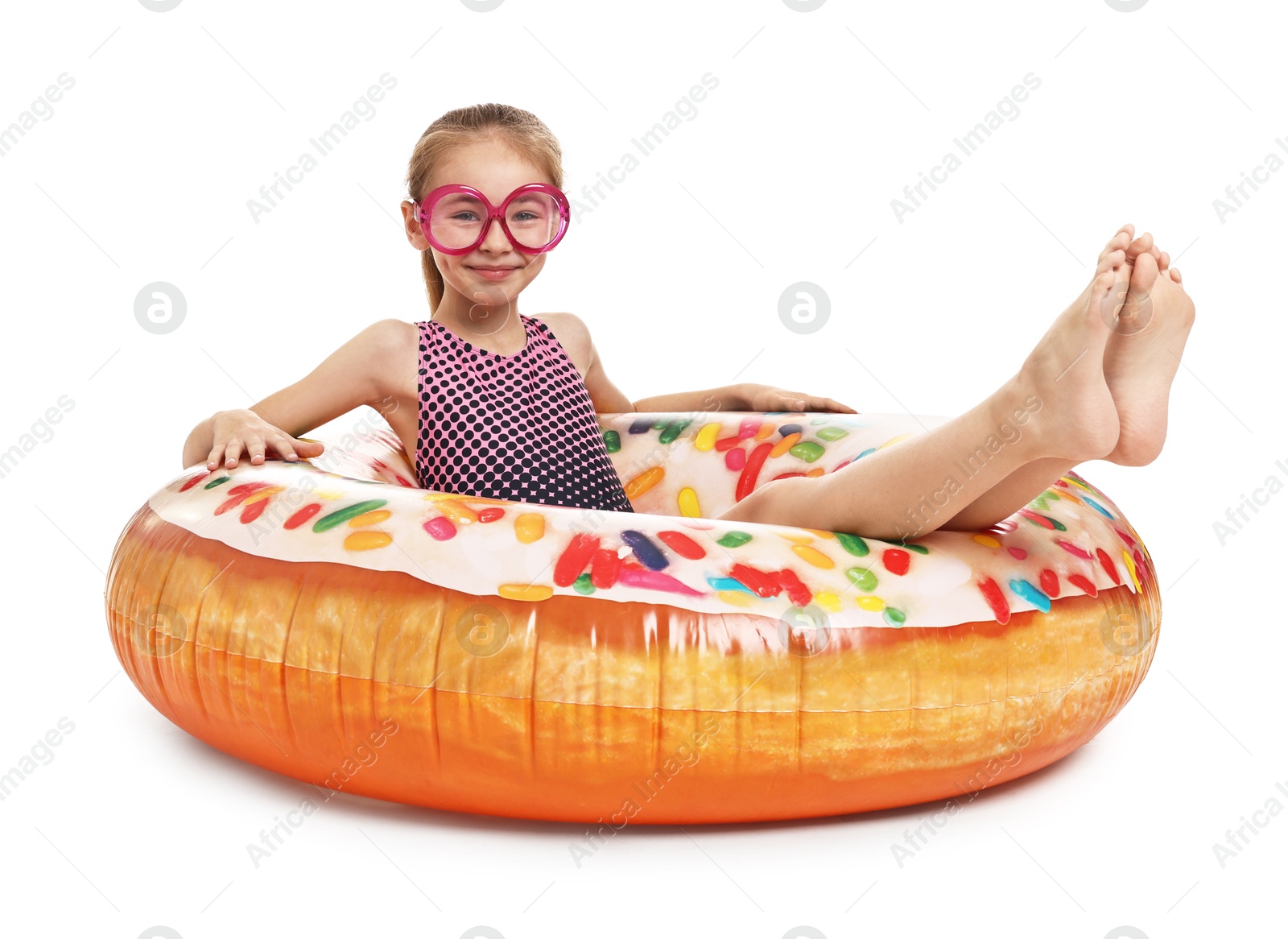 Photo of Happy girl in beachwear with inflatable ring on white background