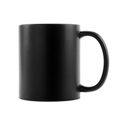 Photo of One blank black ceramic mug isolated on white. Mockup for design