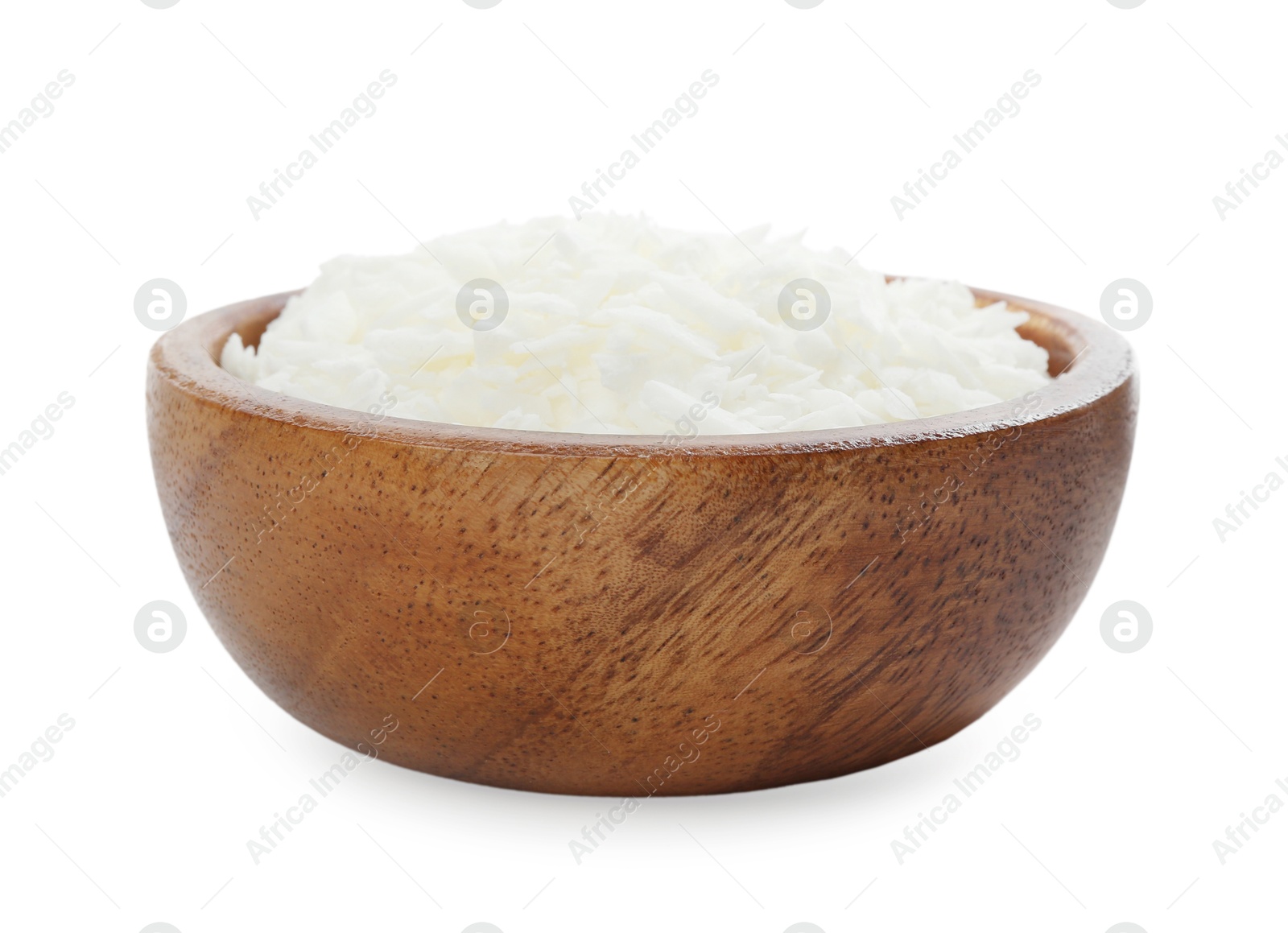 Photo of Soy wax in wooden bowl isolated on white