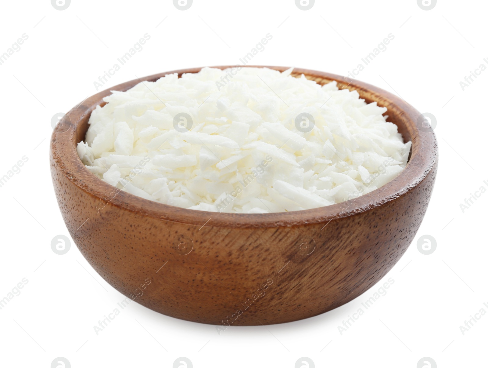 Photo of Soy wax in wooden bowl isolated on white